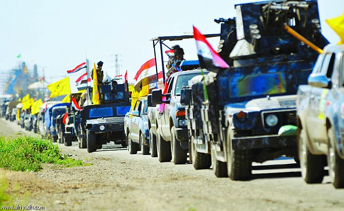 القوات العراقية والحشد الشعبي يقتحمون تكريت من 3 محاور 